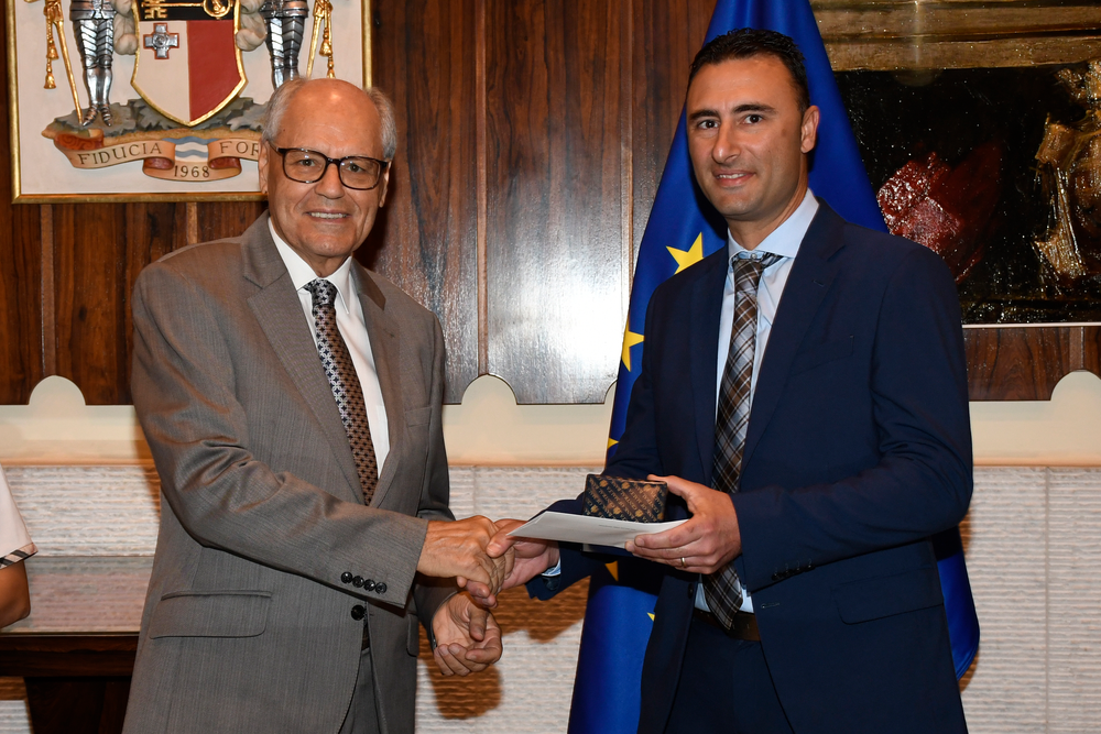 Governor Professor Edward Scicluna with Antoine Scicluna during the 25 years of service ceremony. Governor Professor Edward Scicluna with Antoine Scicluna during the 25 years of service ceremony.