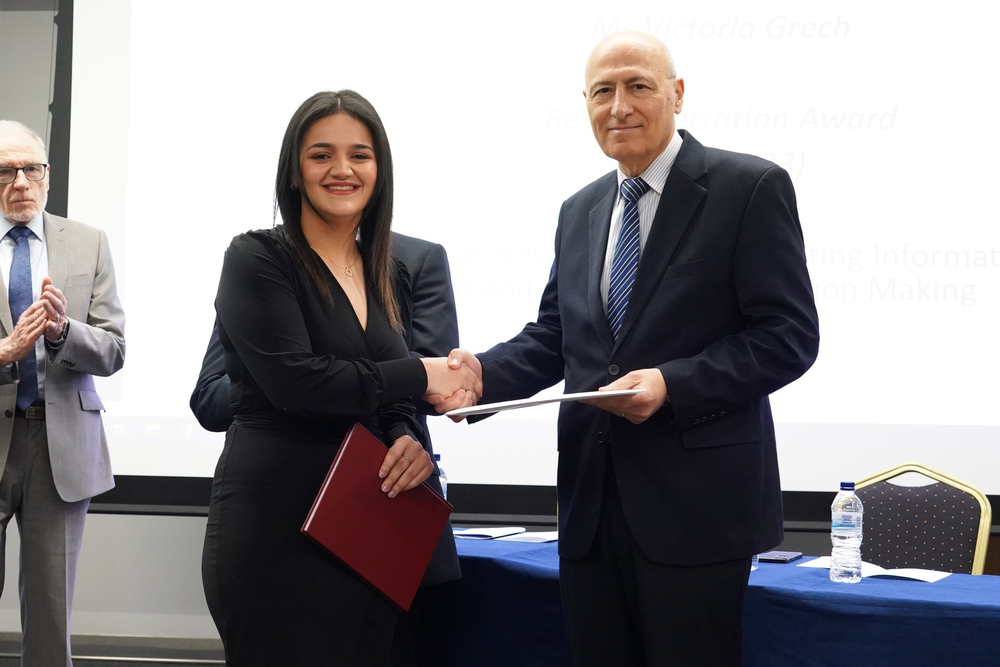 Mr Bonello presented a prize and certificate for the best dissertation of the year Mr Bonello presented a prize and certificate for the best dissertation of the year