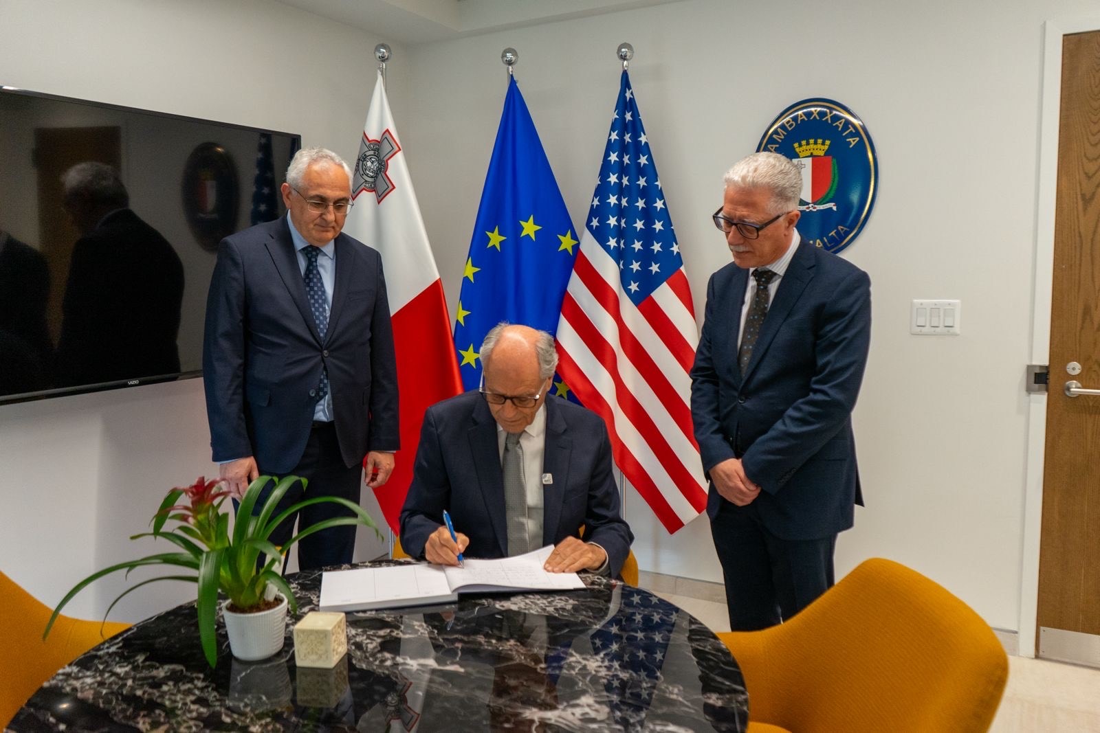 Governor Professor Edward Scicluna signing the visitors’ book at the new Embassy of the Republic of Malta to the United States of America. Governor Professor Edward Scicluna signing the visitors’ book at the new Embassy of the Republic of Malta to the United States of America.